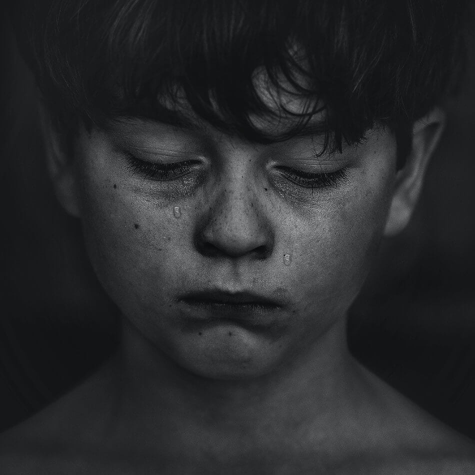 sad child trauma