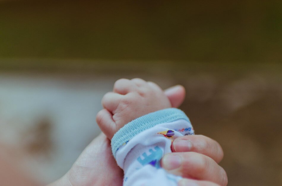 babys hand parenting theory