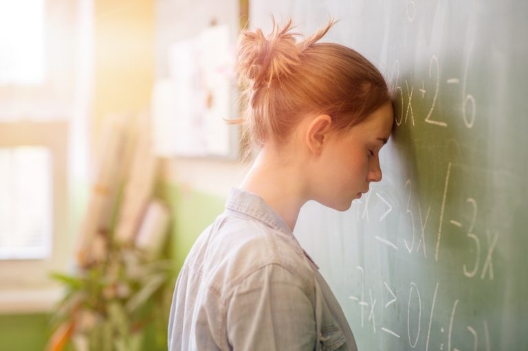 Teenage girl feeling stress and anxiety for exams
