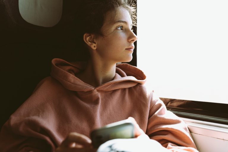 Student teenager girl travels alone, nostalgia, sadness loneliness, loss, depression