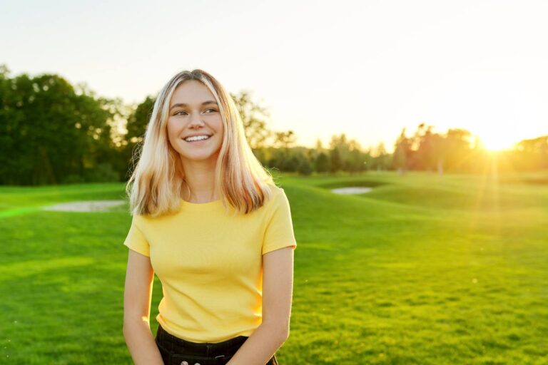 Outdoor portrait of smiling teenage girl
