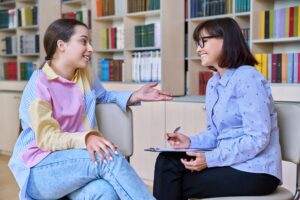 Psychologist, high school behavior counseling teenage student