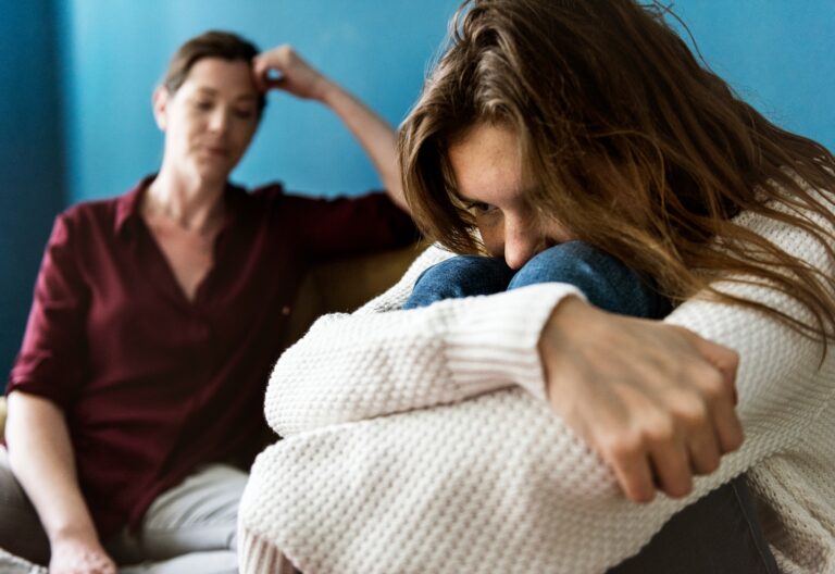 Mother and teenage daughter having discussion, concept of depression on eating disorders