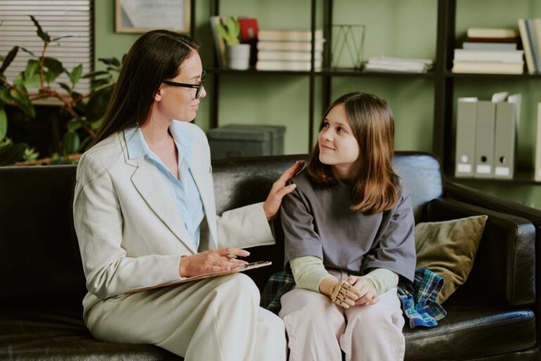 Professional Counseling Session between therapist and a teeenager